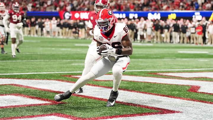 iDec 6, 2025; Atlanta, GA, USA; Georgia Bulldogs wide receiver Dillon Bell (86) makes a catch to score a touchdown during the second quarter against the Alabama Crimson Tide during the 2025 SEC Championship game at Mercedes-Benz Stadium. Mandatory Credit: Dale Zanine-Imagn Images