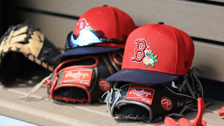 Mar 2, 2026; Dunedin, Florida, USA;  A detail view of Boston Red Sox hats and gloves during the first inning against the Boston Red Sox at TD Ballpark. Mandatory Credit: Kim Klement Neitzel-Imagn Images
