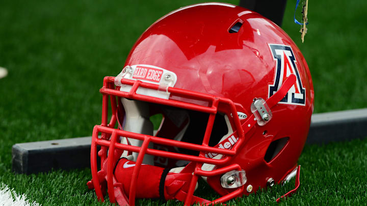 Dec. 15, 2012; Albuquerque, NM, USA; Detailed view of an Arizona Wildcats helmet during the game against the Nevada Wolf Pack in the 2012 New Mexico Bowl at University Stadium. Arizona defeated Nevada 49-48. Mandatory Credit: Mark J. Rebilas-Imagn Images Dec. 15, 2012; Albuquerque, NM, USA; Detailed view of an Arizona Wildcats helmet during the game against the Nevada Wolf Pack in the 2012 New Mexico Bowl at University Stadium. Arizona defeated Nevada 49-48. Mandatory Credit: Mark J. Rebilas-Imagn Images