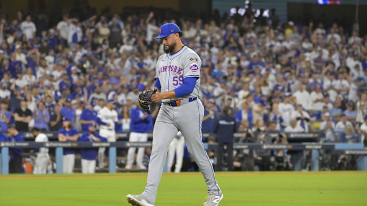 Oct 20, 2024; Los Angeles, California, USA; New York Mets pitcher Sean Manaea (59) walks to the dugout after being relieved in the third inning against the Los Angeles Dodgers during game six of the NLCS for the 2024 MLB playoffs at Dodger Stadium. Mandatory Credit: Jayne Kamin-Oncea-Imagn Images