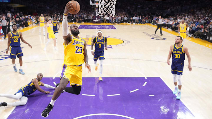 Apr 9, 2024; Los Angeles, California, USA; Los Angeles Lakers forward LeBron James (23) shoots the ball against the Golden State Warriors in the second half at Crypto.com Arena. Mandatory Credit: Kirby Lee-Imagn Images