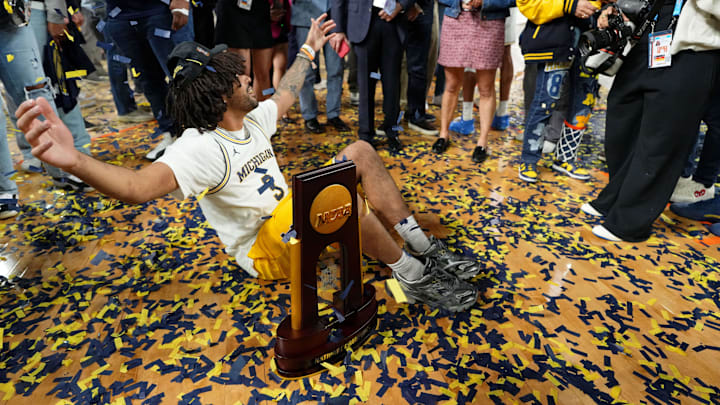 Apr 6, 2026; Indianapolis, IN, USA; Michigan Wolverines guard Elliot Cadeau (3) celebrates.