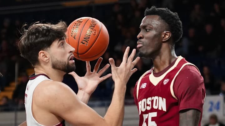 Jason Asemota stares down Leonardo Bettiol at MassMutual Center on Dec. 10, 2025.