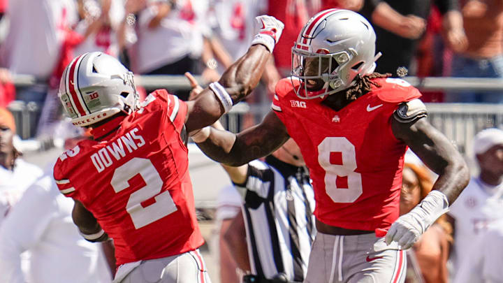 Ohio State Buckeyes safety Caleb Downs (2) and linebacker Arvell Reese (8) celebrate during the second half of the NCAA football game against the Texas Longhorns at Ohio Stadium on Aug. 30, 2025. Ohio State won 14-7. Ohio State Buckeyes safety Caleb Downs (2) and linebacker Arvell Reese (8) celebrate during the second half of the NCAA football game against the Texas Longhorns at Ohio Stadium on Aug. 30, 2025. Ohio State won 14-7.