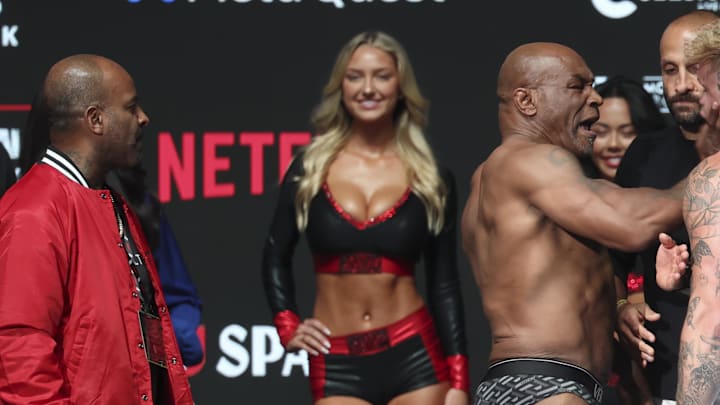 Mike Tyson slaps Jake Paul after weighing in for their Netflix fight. Mike Tyson slaps Jake Paul after weighing in for their Netflix fight.