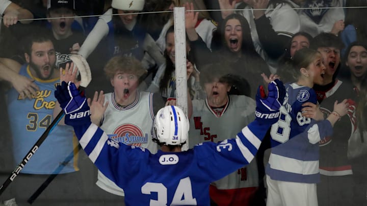 Brookfield East Co-op's Cooper Simon (34) celebrates scoring the game-winning goal in overtime against Chippewa Falls High School during their WIAA Division 1 boys semifinal hockey game Friday, March 1, 2024, at Bob Suter's Capitol Ice Arena in Middleton, Wisconsin. Brookfield East Co-op won 6-5 in overtime.