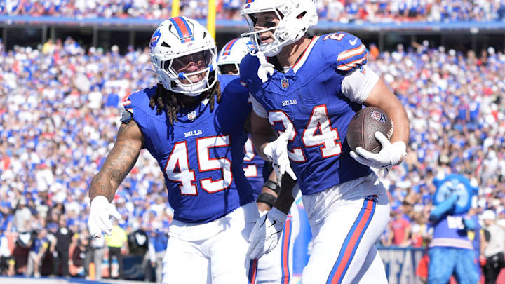 Sep 28, 2025; Orchard Park, New York, USA; Buffalo Bills safety Cole Bishop (24) and outside linebacker Shaq Thompson (45) celebrate after intercepting a pass intended for New Orleans Saints quarterback Spencer Rattler (2) during the second quarter at Highmark Stadium. Sep 28, 2025; Orchard Park, New York, USA; Buffalo Bills safety Cole Bishop (24) and outside linebacker Shaq Thompson (45) celebrate after intercepting a pass intended for New Orleans Saints quarterback Spencer Rattler (2) during the second quarter at Highmark Stadium.
