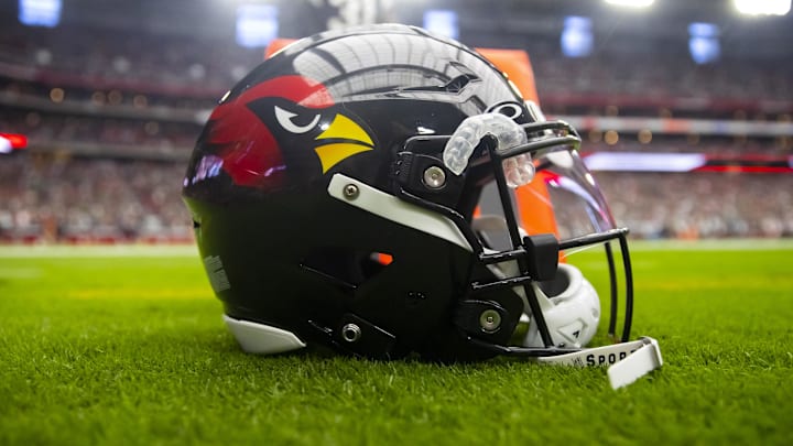 Oct 9, 2022; Glendale, Arizona, USA; Detailed view of a black Arizona Cardinals helmet on the field