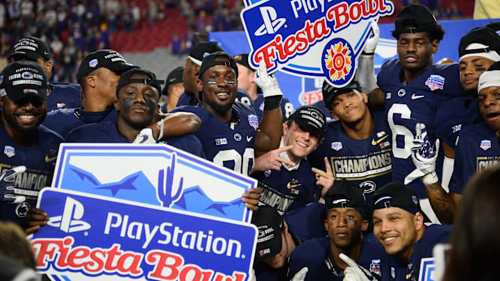 Penn State Nittany Lions players celebrate after defeating the Washington Huskies in the 2017 Fiesta Bowl