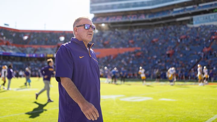 Nov 16, 2024; Gainesville, Florida, USA; LSU Tigers head coach Brian Kelly walks onto the field before a game against the Florida Gators at Ben Hill Griffin Stadium. Mandatory Credit: Matt Pendleton-Imagn Images