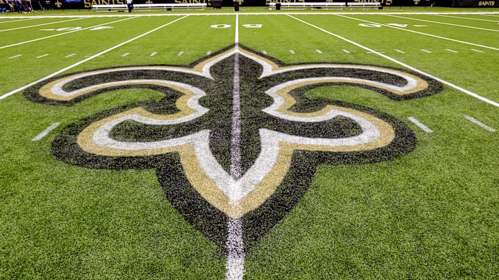 Oct 30, 2022; New Orleans, Louisiana, USA;  General view of the New Orleans Saints logo as the midfield logo fleur-de-lis after the game between the New Orleans Saints and the Las Vegas Raiders at Caesars Superdome. Mandatory Credit: Stephen Lew-Imagn Images