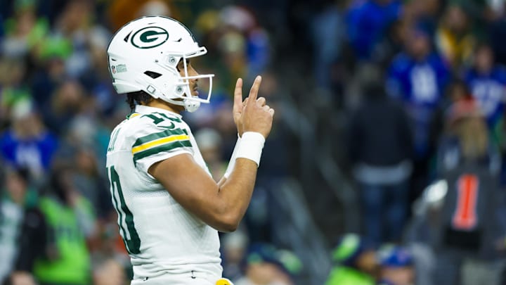 Dec 15, 2024; Seattle, Washington, USA; Green Bay Packers quarterback Jordan Love (10) reacts after completing a pass against the Seattle Seahawks during the second quarter at Lumen Field. Mandatory Credit: Joe Nicholson-Imagn Images