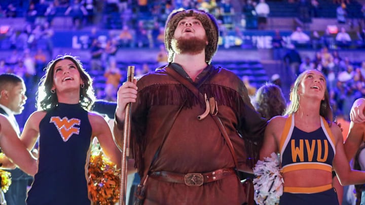 Mar 6, 2026; Morgantown, West Virginia, USA; The West Virginia Mountaineers mascot celebrates after defeating the UCF Knights at Hope Coliseum. Mandatory Credit: Ben Queen-Imagn Images