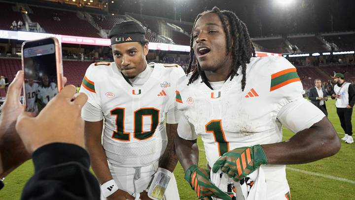 Sep 4, 2026; Stanford, California, USA;  Miami Hurricanes quarterback Darian Mensah (10) and wide receiver Malachi Toney (1) on the field after defeating the Stanford Cardinal at Stanford Stadium.  Mandatory Credit: Stan Szeto-Imagn Images