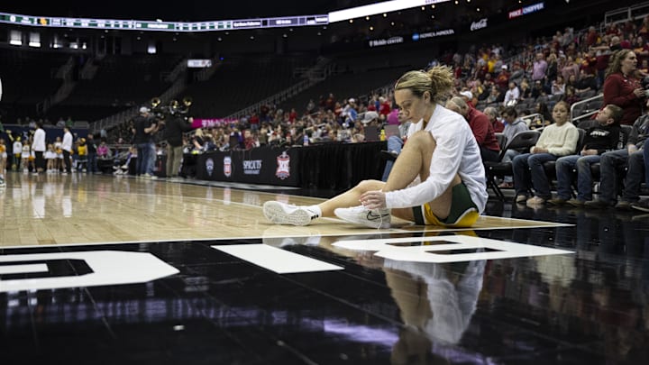 Mar 9, 2024; Kansas City, MO, USA; Baylor Lady Bears guard Jana Van Gytenbeek (4) ties her shoes before facing the Iowa State Cyclones at T-Mobile Center. Mandatory Credit: Amy Kontras-Imagn Images