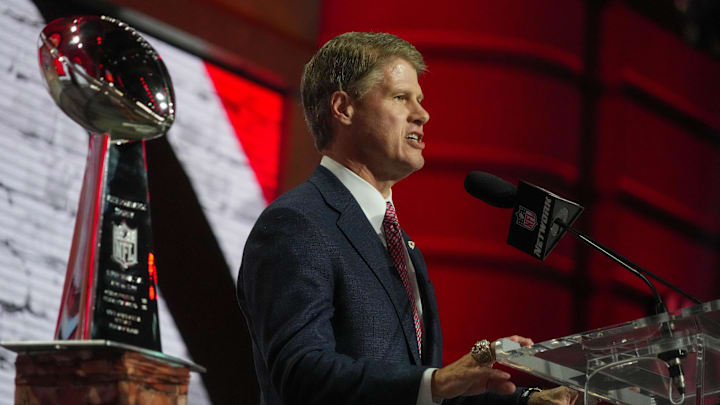 Apr 27, 2023; Kansas City, MO, USA; Kansas City Chiefs owner Clark Hunt announces the Chiefs thirty first overall pick in the first round of the 2023 NFL Draft at Union Station. Mandatory Credit: Kirby Lee-Imagn Images