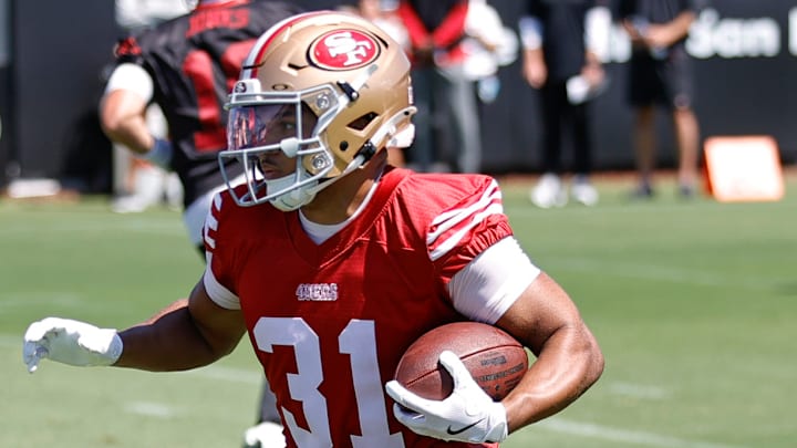 San Francisco 49ers running back Isaac Guerendo (31)