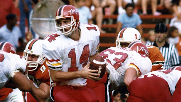 Nov 10, 1984; Miami, FL; USA; FILE PHOTO; Maryland Terrapins quarterback Frank Reich at the Orange Bowl. This game has been deemed one of the greatest comebacks in the history college football. The Terrapins won the game 42-40. Mandatory Credit: RVR Photos-Imagn Images