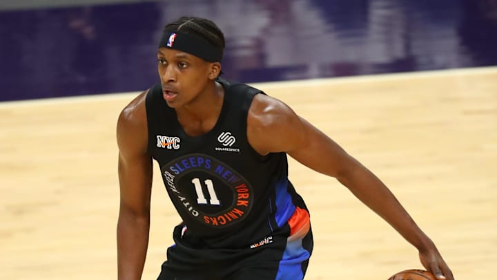 May 7, 2021; Phoenix, Arizona, USA; New York Knicks guard Frank Ntilikina (11) against the Phoenix Suns at Phoenix Suns Arena. Mandatory Credit: Mark J. Rebilas-Imagn Images
