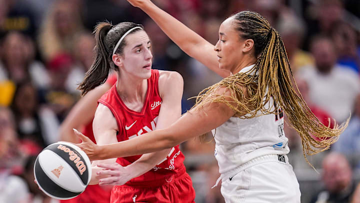 Indiana Fever guard Caitlin Clark (22) passes the ball against Atlanta Dream guard Haley Jones (13) on Thursday, June 13, 2024, during the game at Gainbridge Fieldhouse in Indianapolis. The Indiana Fever defeated the Atlanta Dream, 91-84.