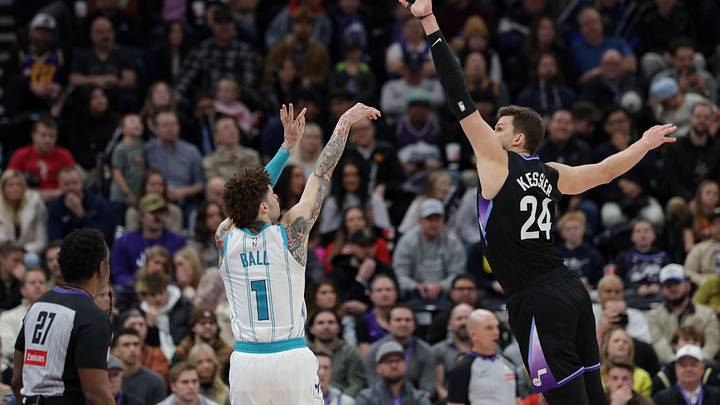 Utah Jazz center Walker Kessler (24) blocks a shot by Charlotte Hornets guard LaMelo Ball Utah Jazz center Walker Kessler (24) blocks a shot by Charlotte Hornets guard LaMelo Ball