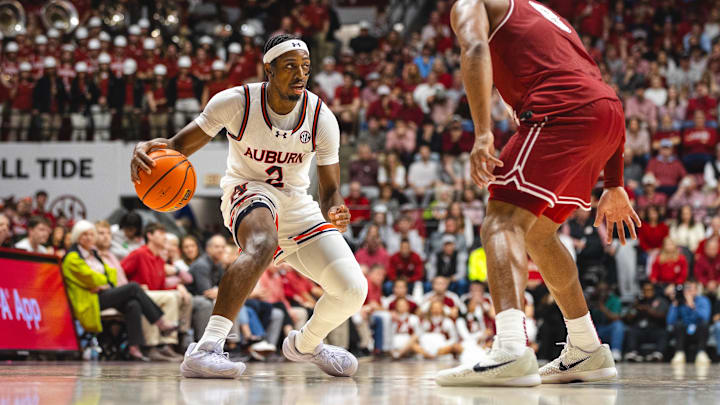 Auburn guard Denver Jones scored 16 points in the Tigers' win over rival Alabama.