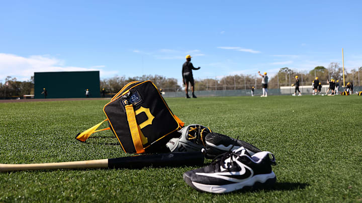 Feb 14, 2024; Bradenton, FL, USA; A detail view of Pittsburgh Pirates third baseman Ke'Bryan Hayes (13) (not pictured) bat, glove, baseball cleats andnd bag as he works out during spring training practice at Pirate City. Mandatory Credit: Kim Klement Neitzel-Imagn Images