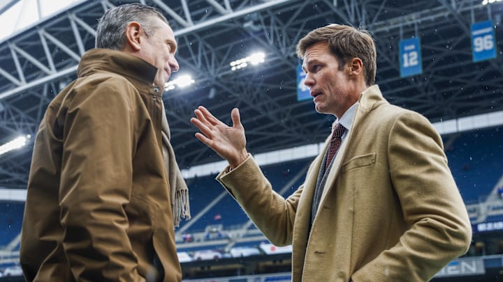 Oct 27, 2024; Seattle, Washington, USA; Former New England Patriots quarterbacks Drew Bledsoe, left, and Tom Brady, right, talk during pregame warmups between the Seattle Seahawks and Buffalo Bills at Lumen Field. Mandatory Credit: Joe Nicholson-Imagn Images