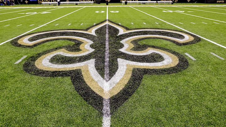 Oct 30, 2022; New Orleans, Louisiana, USA;  General view of the New Orleans Saints logo as the midfield logo fleur-de-lis after the game between the New Orleans Saints and the Las Vegas Raiders at Caesars Superdome. Mandatory Credit: Stephen Lew-Imagn Images
