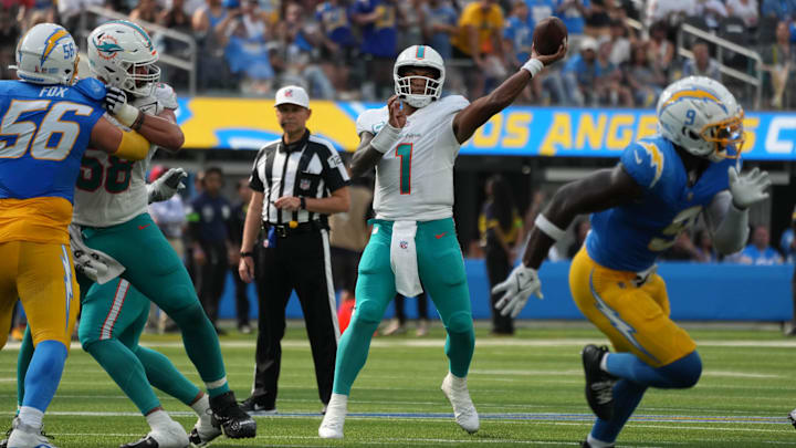 Miami Dolphins quarterback Tua Tagovailoa (1) throws the ball against the Los Angeles Chargers in the second half at SoFi Stadium in the 2023 opener. Miami Dolphins quarterback Tua Tagovailoa (1) throws the ball against the Los Angeles Chargers in the second half at SoFi Stadium in the 2023 opener.