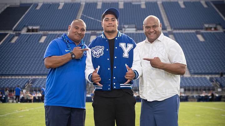 BYU commit Uhila Wolfgramm with BYU head coach Kalani Sitake and associate head coach Sione Po'uha during his official visit BYU commit Uhila Wolfgramm with BYU head coach Kalani Sitake and associate head coach Sione Po'uha during his official visit