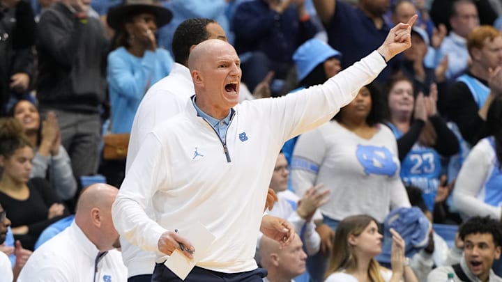 Jan 4, 2023; Chapel Hill, North Carolina, USA;  North Carolina Tar Heels assistant coach Brad Frederick reacts in the second half at Dean E. Smith Center. Mandatory Credit: Bob Donnan-Imagn Images