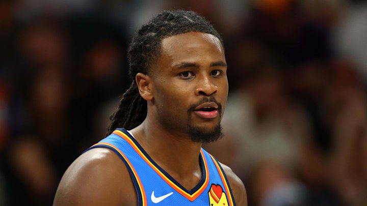 Apr 27, 2026; Phoenix, Arizona, USA; Oklahoma City Thunder guard Cason Wallace (22) against the Phoenix Suns during game four of the first round of the 2026 NBA Playoffs at Mortgage Matchup Center. Mandatory Credit: Mark J. Rebilas-Imagn Images