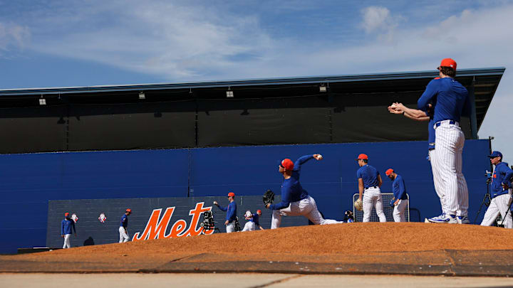 The New York Mets pitchers and catchers take part in their first day of spring training on the back fields of Clover Park on Feb. 11, 2026, in Port St. Lucie.
