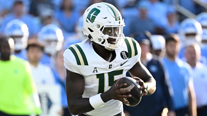 Sep 7, 2024; Chapel Hill, North Carolina, USA; Charlotte 49ers quarterback Deshawn Purdie (15) looks to pass in the third quarter at Kenan Memorial Stadium. Mandatory Credit: Bob Donnan-Imagn Images