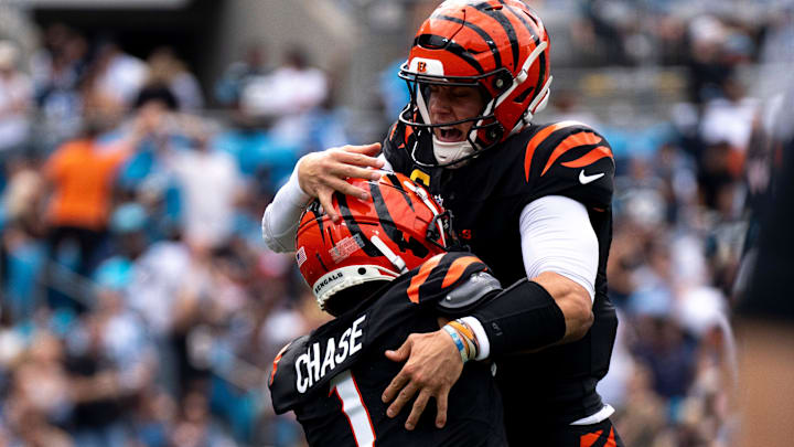 Cincinnati Bengals wide receiver Ja'Marr Chase (1) celebrates with Cincinnati Bengals quarterback Joe Burrow (9) after scoring a touchdown in the second quarter of the NFL game against the Carolina Panthers at Bank of America Stadium in Charlotte, N.C., on Sunday, Sept. 29, 2024.