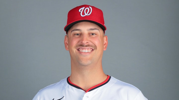 Feb 21, 2025; West Palm Beach, FL, USA; Washington Nationals first baseman Nathaniel Lowe (33) poses for a photo during picture day at CACTI Park of the Palm Beaches. 