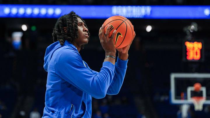 Kentucky's Jayden Quaintance shoots baskets while warming up with his team before the Hoosiers and Wildcats play college basketball at Rupp Arena in Lexington, Kentucky December 13, 2025. Kentucky's Jayden Quaintance shoots baskets while warming up with his team before the Hoosiers and Wildcats play college basketball at Rupp Arena in Lexington, Kentucky December 13, 2025.