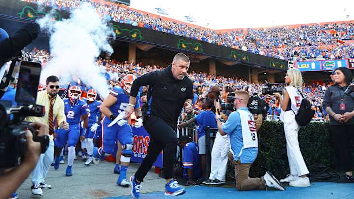 Nov 16, 2024; Gainesville, Florida, USA; Florida Gators head coach Billy Napier leads the team out of the tunnel prior to the game against the LSU Tigers  at Ben Hill Griffin Stadium. Mandatory Credit: Kim Klement Neitzel-Imagn Images