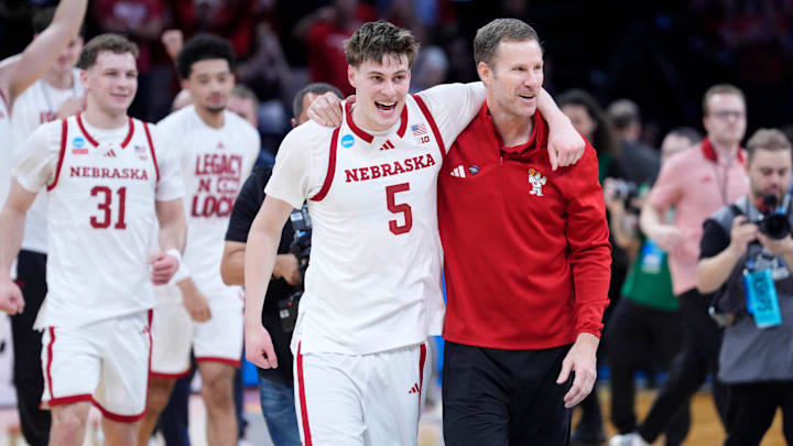 Nebraska coach Fred Hoiberg celebrates with Nebraska Cornhuskers forward Braden Frager (5) during a first-round game in the NCAA men's basketball tournament between Nebraska and Troy at Paycom Center in Oklahoma City, Thursday, March 19, 2026.