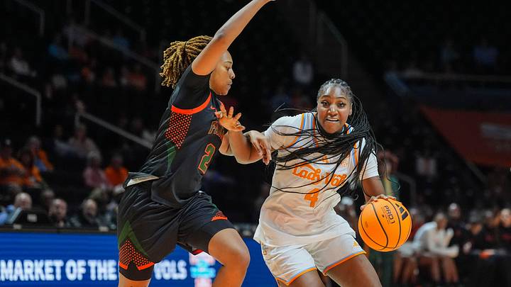 Tennessee's Gabby Minus (4) dribbles around Florida A&M guard Persais Williams (2) during a women’s college basketball exhibition game between the Tennessee Lady Vols and Florida A&M Rattlers at Thompson-Boling Arena at Food City Center on Oct. 27, 2026. Tennessee's Gabby Minus (4) dribbles around Florida A&M guard Persais Williams (2) during a women’s college basketball exhibition game between the Tennessee Lady Vols and Florida A&M Rattlers at Thompson-Boling Arena at Food City Center on Oct. 27, 2026.