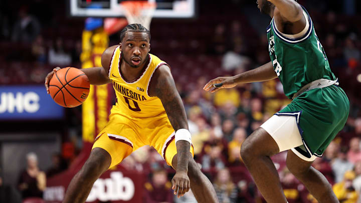 Nov 18, 2025; Minneapolis, Minnesota, USA; Minnesota Golden Gophers guard Chansey Willis Jr. (0) dribbles the ball as Chicago State Cougars guard Dakari Thomas (25) defends during the first half at Williams Arena. Mandatory Credit: Matt Krohn-Imagn Images