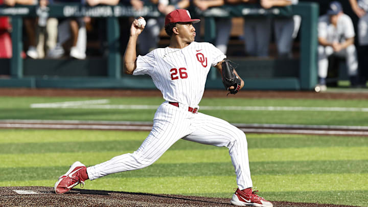 May 31, 2024; Norman, OK, USA; Oklahoma Sooners pitcher Kyson Witherspoon (26) throws a pitch during the first inning of an NCAA Division I Baseball Championship game between the Oral Roberts Golden Eagles and the Oklahoma Sooners at L. Dale Mitchell Park. Credit: Alonzo Adams-Imagn Images