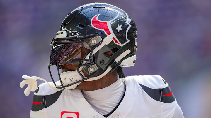 Sep 22, 2024; Minneapolis, Minnesota, USA; Houston Texans wide receiver Stefon Diggs (1) warms up before the game against the Minnesota Vikings at U.S. Bank Stadium. Mandatory Credit: Brad Rempel-Imagn Images