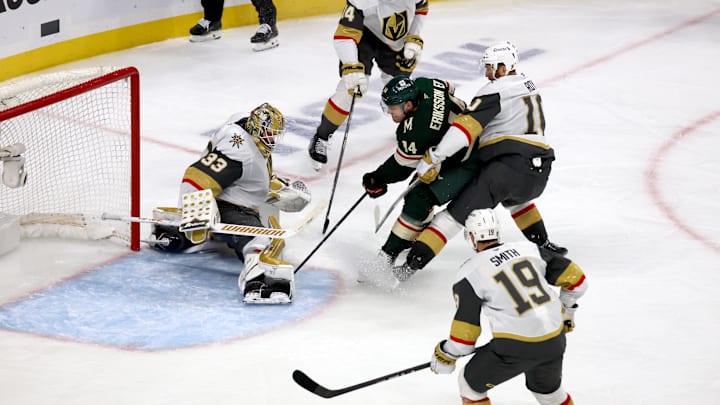 Apr 26, 2025; Saint Paul, Minnesota, USA; Minnesota Wild center Joel Eriksson Ek (14) crashes the net during 1st OT in game four of the first round of the 2025 Stanley Cup Playoffs at Xcel Energy Center. Mandatory Credit: Bruce Fedyck-Imagn Images
