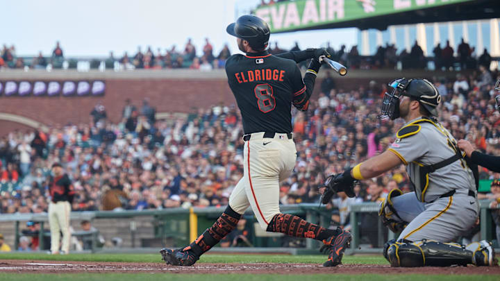 May 9, 2026; San Francisco, California, USA; San Francisco Giants designated hitter Bryce Eldridge (8) bats against Pittsburgh Pirates catcher Joey Bart (14) during the second inning at Oracle Park. Mandatory Credit: Robert Edwards-Imagn Images
