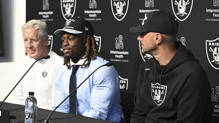 Apr 25, 2025; Henderson, NV, USA; (L-R) Las Vegas Raiders head coach Pete Carroll, Ashton Jeanty and general manager John Spytek during a news conference introducing Jeanty as the first round draft pick in the 2025 NFL Draft at Intermountain Health Performance Center. Mandatory Credit: Candice Ward-Imagn Images