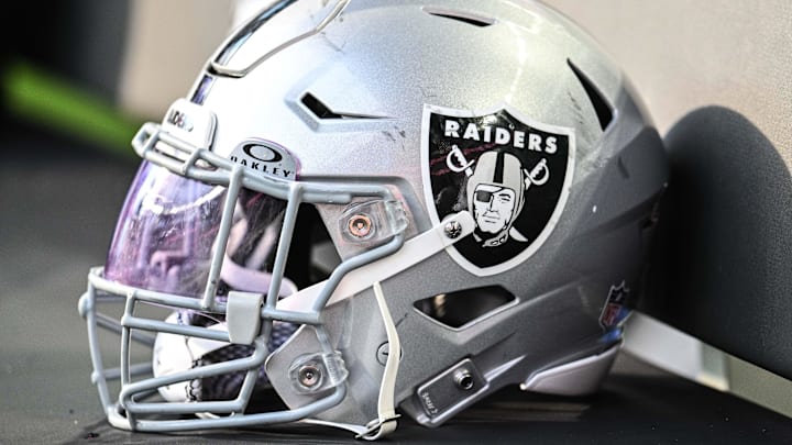 Aug 10, 2024; Minneapolis, Minnesota, USA; A Las Vegas Raiders helmet sits on the team bench before the game against the Minnesota Vikings at U.S. Bank Stadium. Mandatory Credit: Jeffrey Becker-Imagn Images