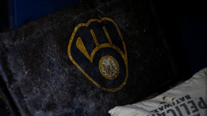Jul 27, 2024; Milwaukee, Wisconsin, USA;  Milwaukee Brewers logo on equipment  in the dugout prior to the game against the Miami Marlins at American Family Field. Mandatory Credit: Jeff Hanisch-Imagn Images