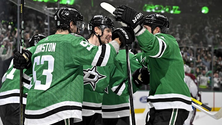 May 15, 2024; Dallas, Texas, USA; Dallas Stars defenseman Miro Heiskanen (4) and left wing Jason Robertson (21) and center Wyatt Johnston (53) and left wing Jamie Benn (14) celebrates a power play goal scored by Heiskanen against the Colorado Avalanche during the second period in game five of the second round of the 2024 Stanley Cup Playoffs at American Airlines Center. Mandatory Credit: Jerome Miron-USA TODAY Sports